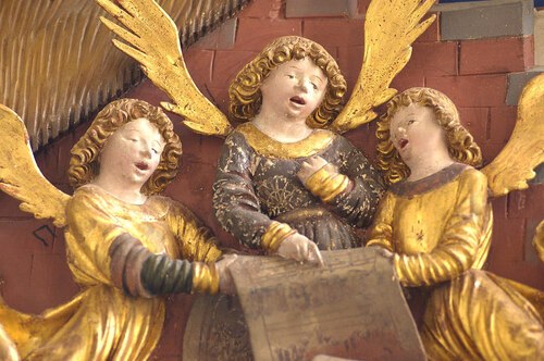 Die besondere Bedeutung des Weihnachtsfestes kommt auch in der feierlichen kirchenmusikalischen Gestaltung der Gottesdienste am Christtag zum Ausdruck.<br />
Singende Engel: Ausschnitt Flügelaltar, Wallfahrtskirche St. Wolfgang ob Grades, 1515<br />
Foto: Nachlass Prof. Heinz Ellersdorfer Die besondere Bedeutung des Weihnachtsfestes kommt auch in der feierlichen kirchenmusikalischen Gestaltung der Gottesdienste am Christtag zum Ausdruck.<br />
Singende Engel: Ausschnitt Flügelaltar, Wallfahrtskirche St. Wolfgang ob Grades, 1515<br />
Foto: Nachlass Prof. Heinz Ellersdorfer